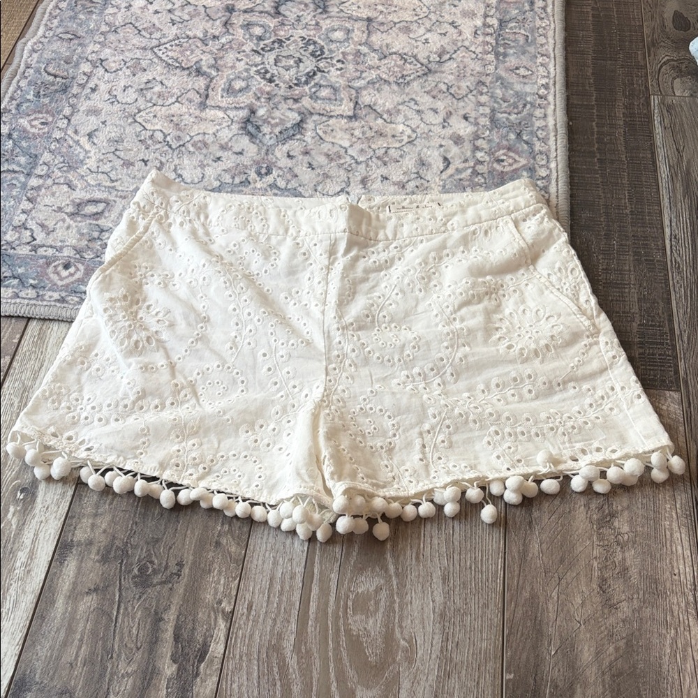 Willow & Clay Cream Eyelet Pom-Pom High Waist Shorts with front pockets
